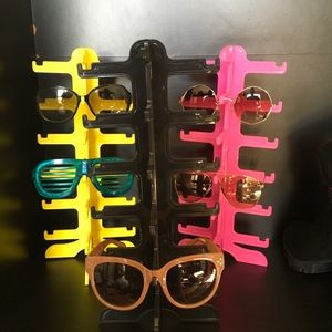 Sunglass holders/stands